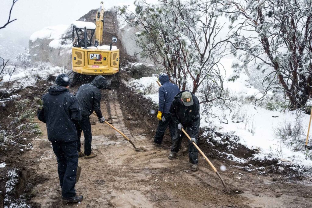 Men working in the snow