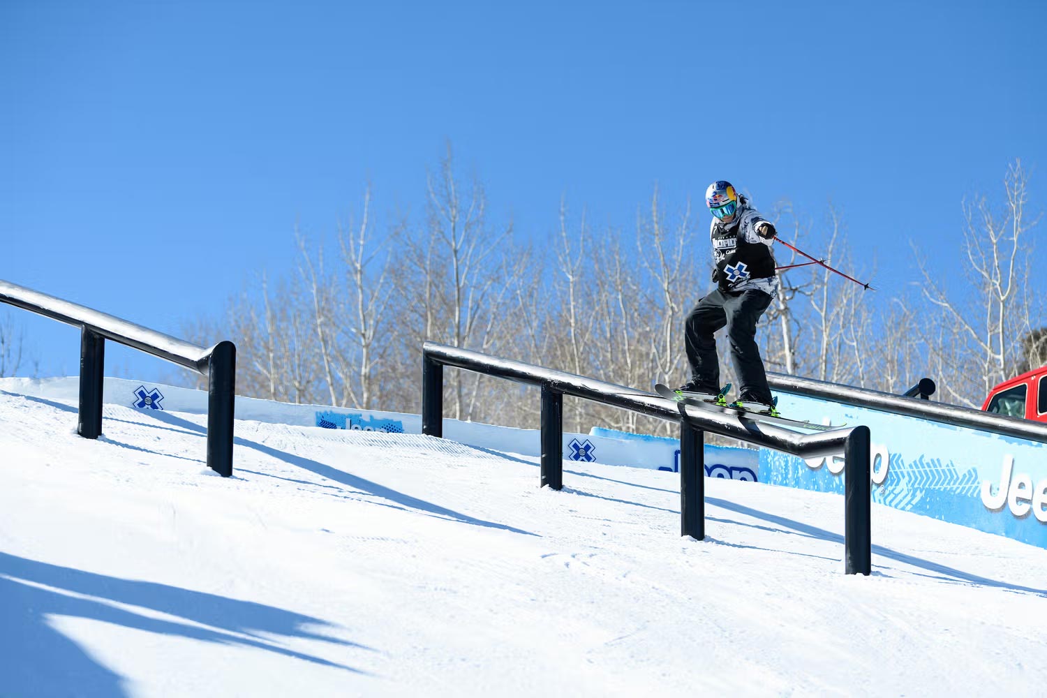 Nick Goepper grinding a rail on skis