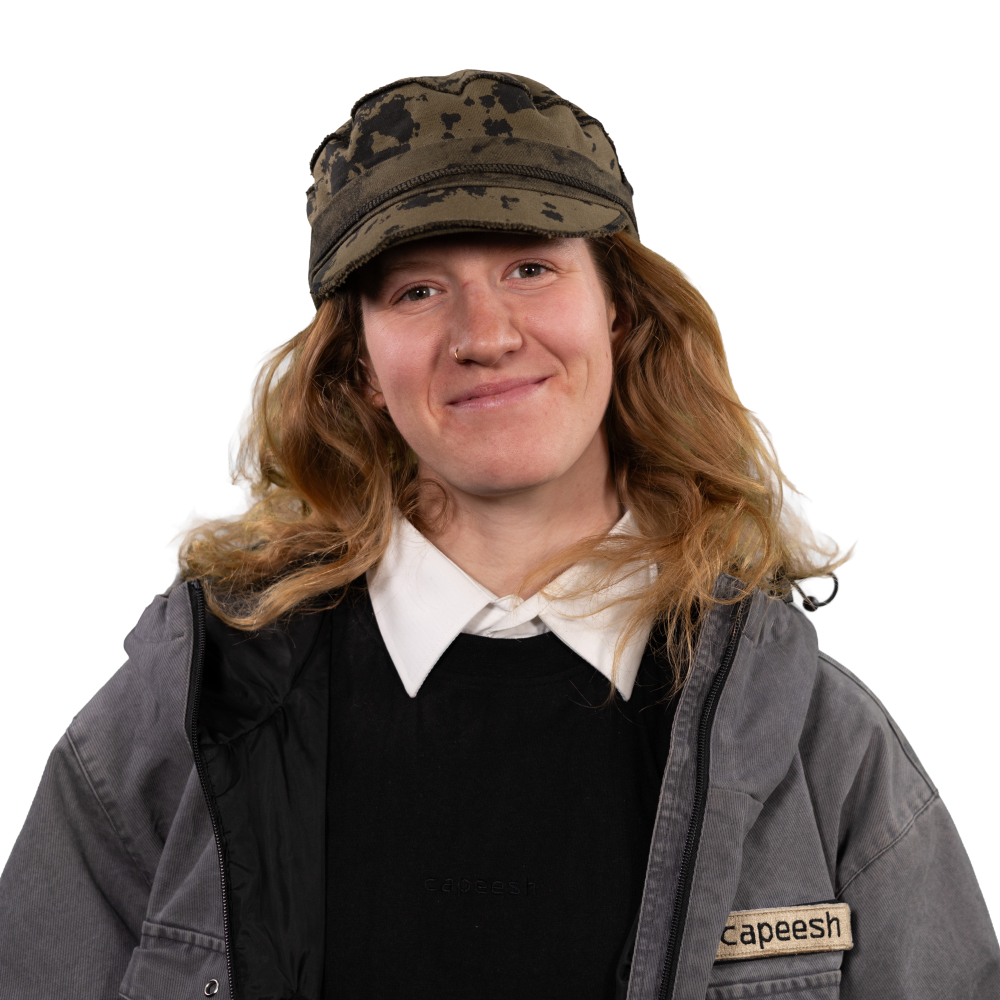 Alais Develay wearing a hat